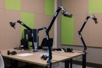 The Sound Booth features professional microphones, headphones, and editing software for creating high-quality recordings and podcasts.