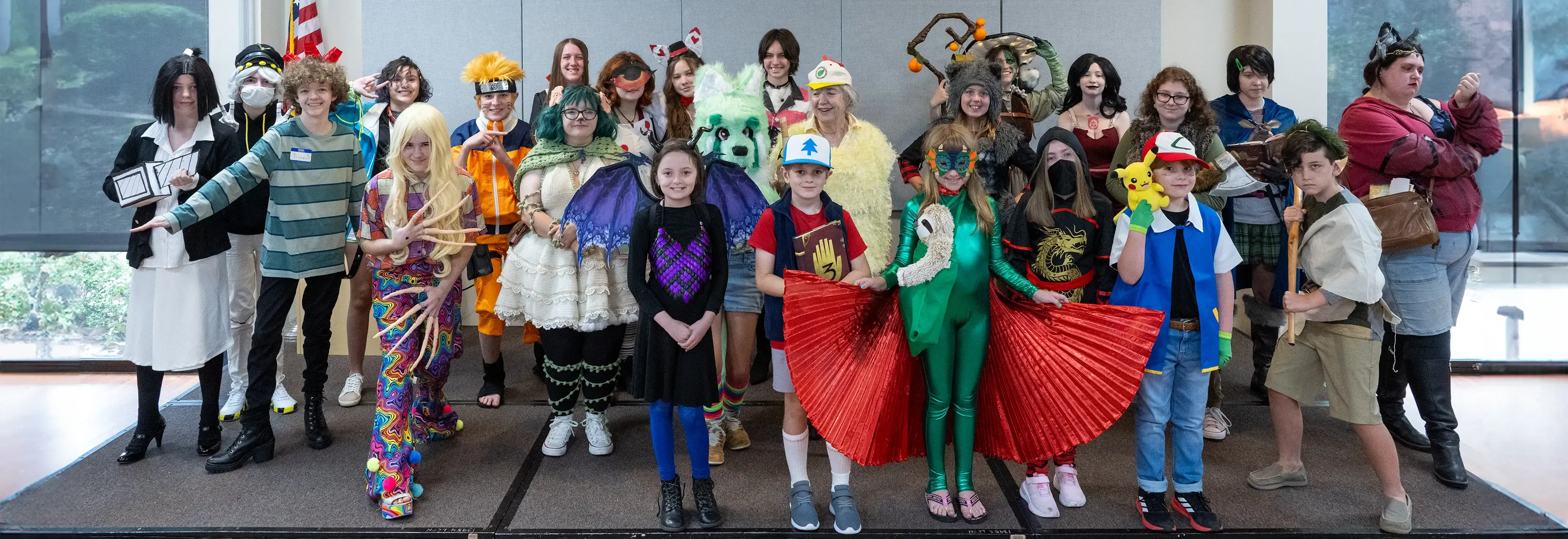 Cosplayers pose for a group photo